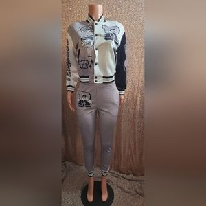 Jogging suit With Fearleas On The Sleeve. Jacket Worn Once. Pants Never Worn.